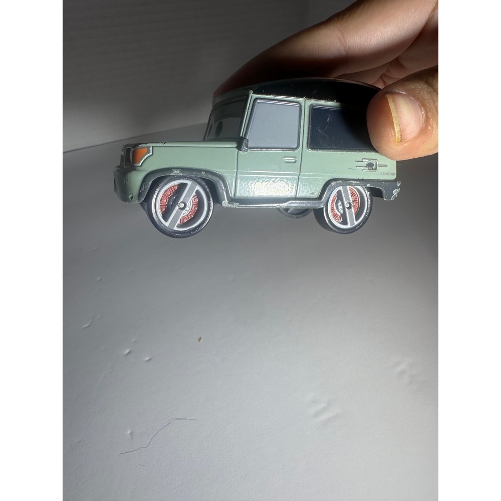 Disney Pixar Cars Sir Miles Axlerod Green Diecast Toy Car Cars 2 - Picture 10 of 11